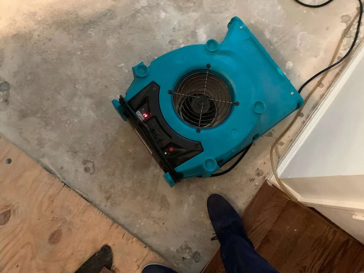 Air mover drying subfloor during Leak Detection & Repair in Blue Ash